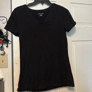 Women’s medium black V-neck T-shirt.